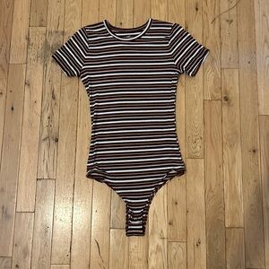 Hollister slim tee small burgundy, black, yellow, white, and pink stripes.